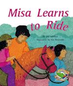 Misa Learns to Ride