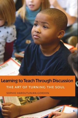 Learning to Teach Through Discussion