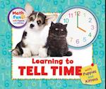 Learning to Tell Time with Puppies and Kittens