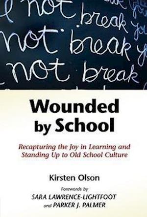 Olson, K:  Wounded by School