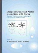 Charged Particle and Photon Interactions with Matter