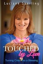 Touched by Love: Turning Crisis into a Blessing 