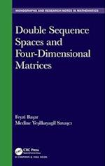 Double Sequence Spaces and Four-Dimensional Matrices