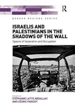 Israelis and Palestinians in the Shadows of the Wall