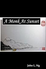 a monk at sunset