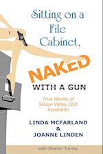 Sitting on a File Cabinet, Naked, with a Gun