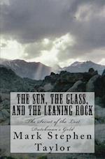 The Sun, the Glass, and the Leaning Rock