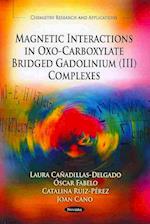 Magnetic Interactions in Oxo-Carboxylate Bridged Gadolinium (III) Complexes