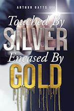 Touched By Silver Encased By Gold
