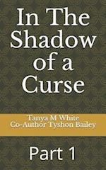 In The Shadow of a Curse