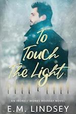 To Touch the Light: An Irons and Works Holiday Novel 