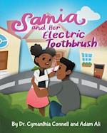 Samia and her electric toothbrush