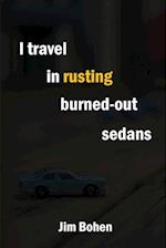 I Travel in Rusting Burned-Out Sedans