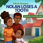 Nolan Loses A Tooth 