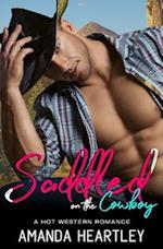 Saddled On The Cowboy: A Hot Western Romance 