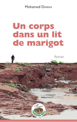 Un corps dans un lit de marigot