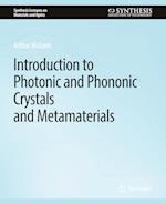 Introduction to Photonic and Phononic Crystals and Metamaterials