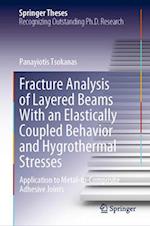 Fracture Analysis of Layered Beams With an Elastically Coupled Behavior and Hygrothermal Stresses