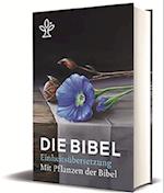 Die Bibel mit Bildern von biblischen Pflanzen