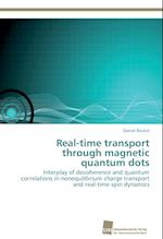 Real-time transport through magnetic quantum dots