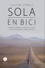 Sola en bici