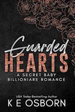 Guarded Hearts: A Secret Baby Billionaire Romance 