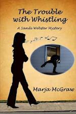 The Trouble with Whistling: A Sandi Webster Mystery 