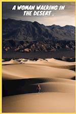 A woman walking on sand dunes.