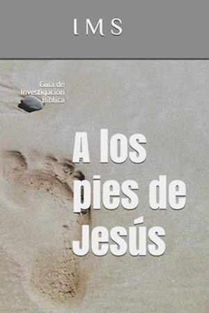 A los pies de Jesús