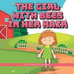 The girl with bees in her hair: The story of a young girl and her bees, which happen to be living in her hair. 