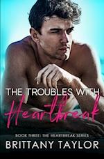 The Troubles with Heartbreak: A Fake Engagement Sports Romance 